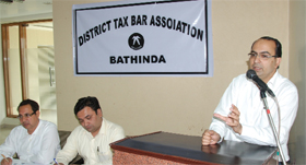 Neeraj Chawla, a chartered accountant, addresses a seminar organised by the District Tax Bar Association in Bathinda on Saturday.
