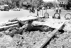 A day after a woman died at the Kumbra traffic light point, the local authorities got the caved-in sewer line covered with earth