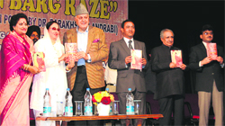 Union Minister Dr Farooq Abdullah releases a book at a function in Jammu 