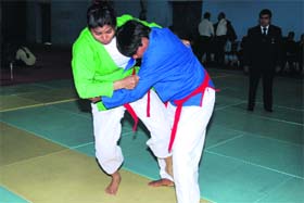 A bout in progress on the opening day of the Senior National Kurash Championship in Ludhiana on Saturday