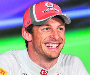 McLaren-Mercedes driver Jenson Button of Britain is all smiles after winning Formula One's Australian Grand Prix in Melbourne