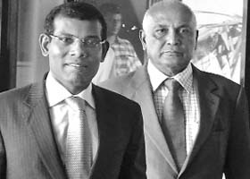 Ousted Maldives president Mohamed Nasheed (L) in Colombo on Saturday
