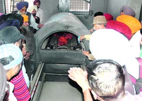 A funeral being conducted at the LPG-run crematorium at in the Chittiwind area of Amritsar