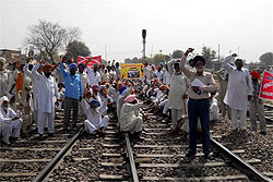 Ex-servicemen blocked railway traffic at Maur on Sunday demanding one rank, one pension