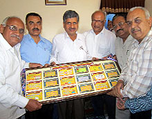 MLA Sarup Chand Singla releases the traffic awareness cards in the presence of the volunteers of the Civil Defence Warden Service