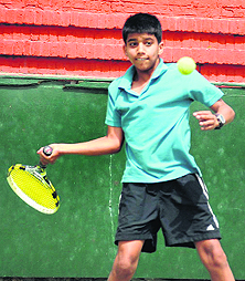 Aditya Vashisht returns a shot during the qualifying round of AITA tournament at CLTA, Sector 10, Chandigarh, on Sunday.