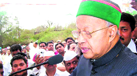 Union Minister Virbhadra Singh addresses a rally at Jawali near Nurpur on Sunday.