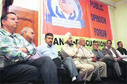 Panelists participate in a seminar organised by the Public Opinion Forum in Jammu on Sunday.