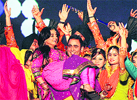 Punjabi singer Sarabjit Cheema with Bollywood actress Divya Dutt at a Punjabi music awards function in Jalandhar on Saturday. 