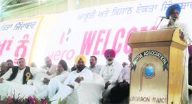 Balbir Singh Rajewal of the Bharti Kisan Union addresses a state-level conference organised by the Federation of Arhtiya Association of Punjab at Jagraon on Sunday.