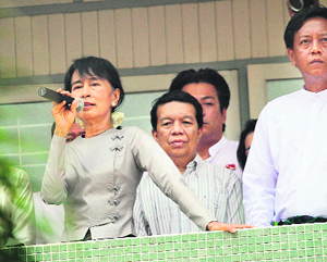 Aung San Suu Kyi addresses supporters in Myeik, southern Myanmar on Sunday.