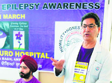 Neurologist Dr Ashok Uppal addresses a seminar in Amritsar on Monday. 
