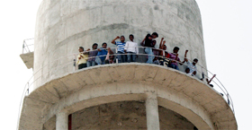 Students atop the water tank at Jaitu town of Faridkot on Monday.