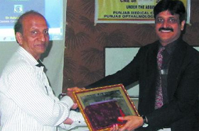 Dr Ashok Sharma (right) of Chandigarh being welcomed at the CME held in Bathinda.