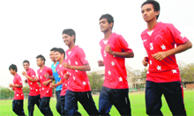 Gurusimrat Singh, Harsharan Chabbra, Nishu Kumar, Shokat Ali, Vikramjeet, Samuel, Ramdin and Zonthan, members of the boys under-16 football team, warm up at the Sports Complex in Sector 42 of Chandigarh on Monday. 
