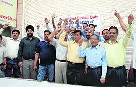 Jewellers stage a demonstration in Dehradun on Monday.