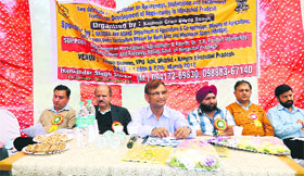 Dr BL Sarswat, Executive Director, National Bee Board, addresses bee-keepers of Himachal Pradesh on the first day of a two-day state-level seminar on bee-keeping at Ichhi in Kangra on Monday. 