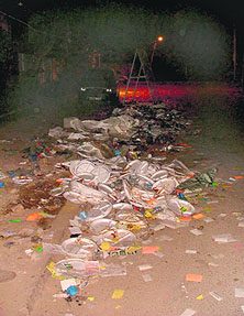 Litter strewn on the road outside the Sutlej Club after the elections on Sunday.