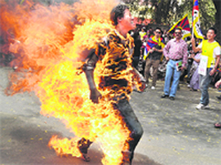 A Tibetan youth commits self-immolation in protest against the upcoming visit of Chinese President Hu Jintao, in New Delhi on Monday.