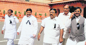Telangana Rashtra Samiti MPs outside Parliament in New Delhi on Monday.