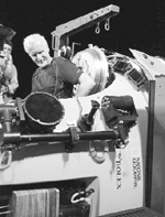 Titanic filmmaker James Cameron slides into the hatch of the Deepsea Challenger submersible in Sydney