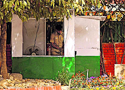A makeshift tent inside the residence of a top government official being removed following HC orders in Chandigarh on Tuesday