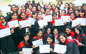 Students of the Postgraduate Government College for Girls, Sector 11, Chandigarh, pose with their degrees on Tuesday