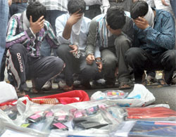 The accused at the PHQ in New Delhi on Tuesday. 
