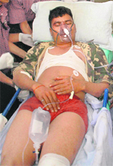 An injured CRPF jawan being taken to a hospital.