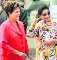 Brazilian President Dilma Rousseff being received by Minister of State for External Affairs Preneet Kaur on her arrival at Palam airport in New Delhi on Tuesday. She is in India to attend the fourth BRICS Summit.