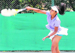 A player returns a shot during her match at the CLTA in Sector 10, Chandigarh, on Wednesday. 