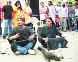 Artistes perform in the play Jab Jago Tabh Sawera at the Sector-17 Plaza in Chandigarh. 