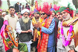 Chairman, Finance Commission, HP, Dile Ram performs puja of a hill deity at the inauguration of the Devta Mela in Sundernagar on Wednesday. Photo: Mahesh Chander Sharma
