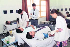 Students donate blood at a camp at the Uttaranchal Institute of Technology near Dehradun on Wednesday