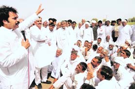 Haryana Janhit Congress president and MP Kuldeep Bishnoi addresses farmers at Mohammadpur Rohi in Fatehabad on Wednesday. A Tribune photograph
