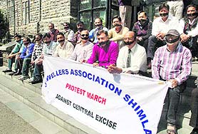 Members of the Jewellers Association protest against the Central excise at the Municipal Corporation office in Shimla on Wednesday.