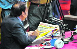 Chairman of the J&K Legislative Council Amrit Malhotra takes a look at Jammu Tribune that carried a series of news reports on the deteriorating condition of the Tawi, in Jammu on Wednesday.