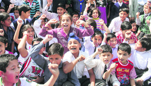 Students stage a protest outside Kendriya Vidyalaya, Lale Da Bagh, in Jammu. 