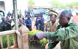 Coup leader Capt. Amadou Haya Sanogo (2nd from right) arrives at his headquarters in Kati
