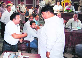 Councillors engaged in a heated argument during a meeting of the MC House in Amritsar on Thursday