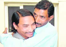 Harish Chandar (left) with his father Bhau Rao in Amritsar on Thursday