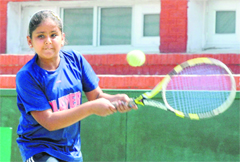 Prinkle Singh plays a shot during a match at the CLTA-AITA Championship Series in Chandigarh on Thursday. 