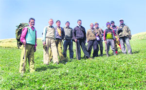 Forest officer Manoj Chandran (in black jacket) with other officials of the Forest Department and shepherds in Pithoragarh.