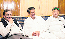 Union Ministers Harish Rawat and Virbhadra Singh along with Birender Singh, Congress general secretary, are all smiles after the state Congress government won a trust vote in Dehradun on Thursday. 