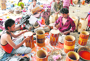 Artisans busy in making dholaks ahead of the wedding season in Karnal. 