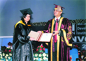 Priyanka receives a degree from Atul K Rahi, Chairman, Management Development Institute, at the convocation in Gurgaon. 