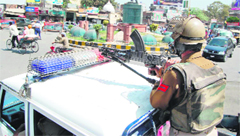 A quick responce team of the Punjab Police deputed in the Hall Gate area in Amritsar on Friday.