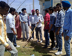 The students clean the campus during an NSS camp organised at the Guru Ram Dass Institute of Engineering and Technology