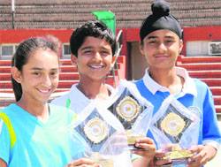 Tennis title winners; Sabyata, Vikas Singh and Paramvir in Single at the CLTA, Sector 8, Chandigarh, on Friday