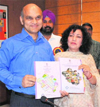 KK Sharma, Adviser to the UT Administrator, releases census data at the UT Guest House in Chandigarh on Friday. 